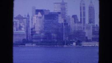 1954: a city is seen with tall buildings along a coastal area NEW YORK