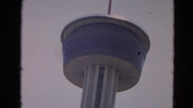 1968: a high tower is seen which has a flag SILVER CITY, NEVADA