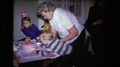 1973: birthday party for little blonde boy with pink cake FORT WAYNE, INDIANA