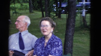 1949: a friend circle is seen sitting together and having a nice time SOMERSET