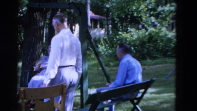 1949: four people outdoors having a conversation at a picnic SOMERSET, KENTUCKY