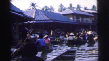 1962: Bangkok Market Scene With People Rowing Boats