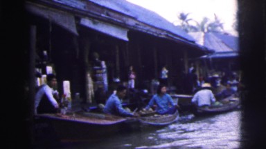 1962: a market area beside a water area is seen BANGKOK, THAILAND