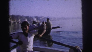 1962: men and women bathing and rowing a boat. BANGKOK, THAILAND