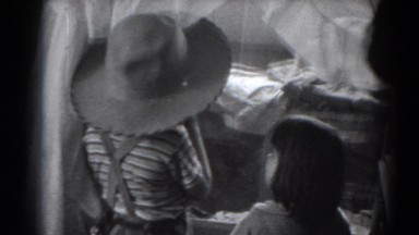 1947: two young girls turn around and smile LINCOLN, NEBRASKA