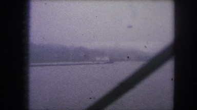 1962: Traveling on a Steel Bridge Over the River in Colorado