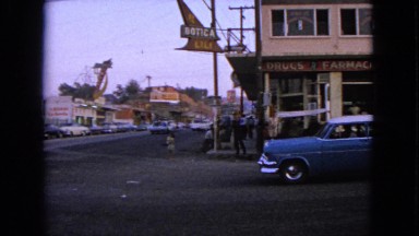 1963: cars traveling on the street in the city BARRINGTON, ILLINOIS