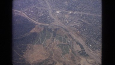 1963: a top down view of a city is seen from an aircraft BARRINGTON, ILLINOIS