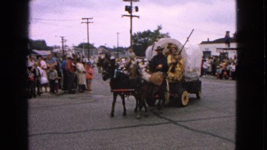 1963: western wagons in parade BARRINGTON, ILLINOIS