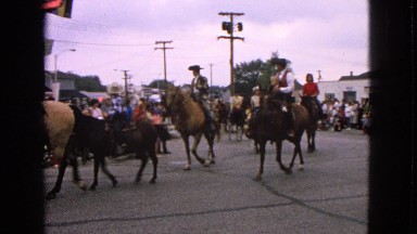 1963: peacock bird free roaming zoo grounds showing plumage near food court