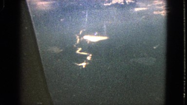 1963: plane high above ground, soaring through the sky BARRINGTON, ILLINOIS