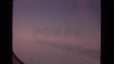 1963: flying over ocean and island BARRINGTON, ILLINOIS