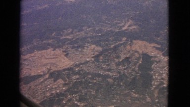 1963: an aerial view of a rugged ridge of wilderness and mountains