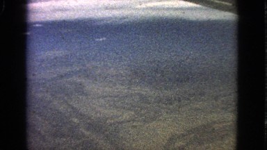 1963: video taken out of an airplane window of land below BARRINGTON, ILLINOIS