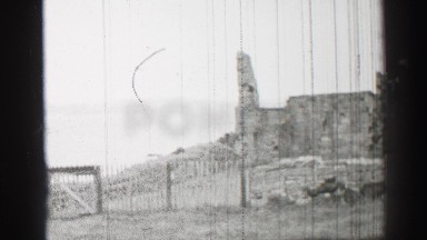 1952: a mountain like scene is seen with a tourist building ENGLAND