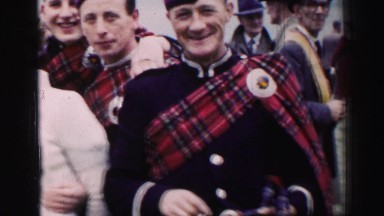 1952: scottish showing their colorful traditional dress with much encouragement