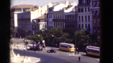 1948: Vintage Automobiles Circling Historic Landmark Near Statues Monument Buses