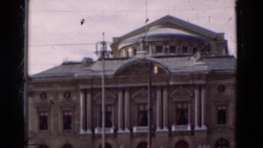 1948: Peacock Bird Free Roaming Zoo Grounds Showing Plumage Near Food