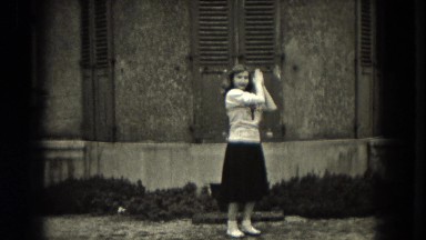 1953: Teenager girl jumping,dancing,yelling out a cheerleading routine on the