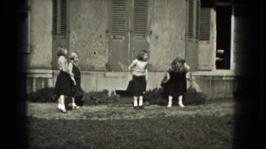 1953: Young Teenage Girls outside showing learned cheerleading moves.MILWAUKEE,