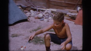 1968: a boy cooking a meal COTTONWOOD, ARIZONA