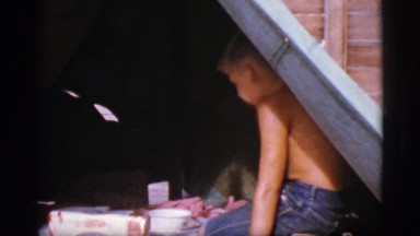 1968: little boys playing inside a tent COTTONWOOD, ARIZONA