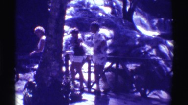 1971: people walking near a small waterfall. HAWAII