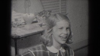 1953: "you guys are funny!" young girl excitedly opens her presents