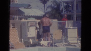 1966: a group of people enjoying the facilities of a swimming pool FLORIDA