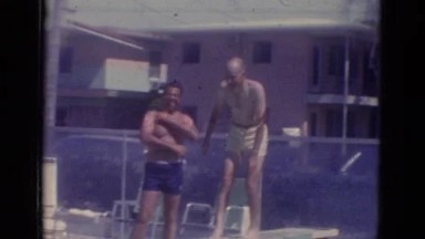 1966: older guy jumps in the pool FLORIDA
