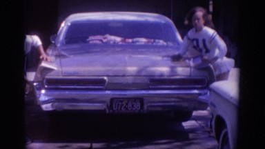 1966: two cheerleaders washing a car FLORIDA