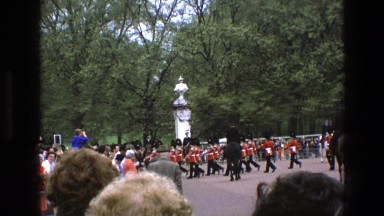 1969: British Security Officer Walking Down Street England