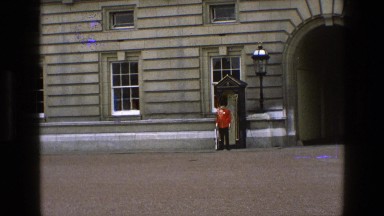 1969: a guard is seen standing alert in front of a royal building ENGLAND