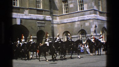 1969: a royal parade is seen of horses with people with uniform ENGLAND