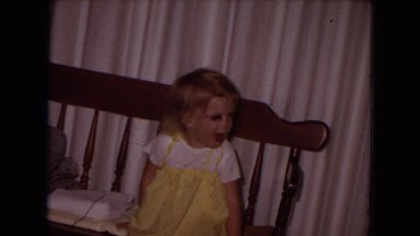 1970: a child is seen posing sitting on a bench WHITE SANDS, FLORIDA