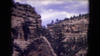 1973: people wander down sparsely vegetated mountain path at day NEW MEXICO