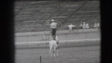 1941: Person Standing on Horse in Nevada Outdoor Scene