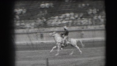 1941: A Horse and Rider Running Fast in Nevada