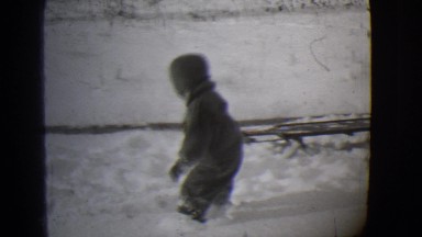 1944: a child is seen playing in snow MICHIGAN