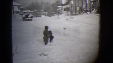 1944: a snowy area is seen with kids MICHIGAN