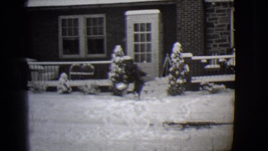 1944: boy working in the snow. MICHIGAN