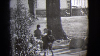 1944: little children playing outside after school
