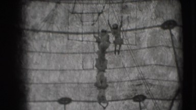 1948: women are seen performing an act inside a caged circus CHICAGO