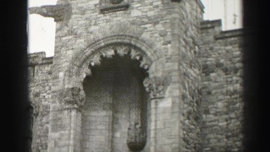 1952: People Stand Outside a Church in Edinburgh, Scotland