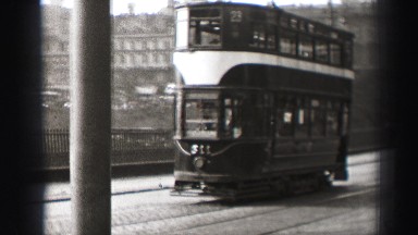 1952: a busy street with tram are seen EDINBOURGH, SCOTLAND