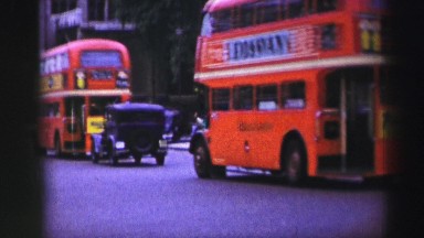1952: people are seen standing beside a royal guard EDINBOURGH, SCOTLAND