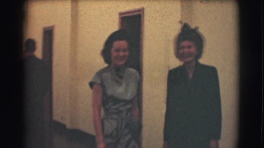 1959: females are seen talking and a child with hat is seen ST. LOUIS