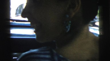 1961: lady seated as a passenger in a moving car. CAMDEN, NEW JERSEY