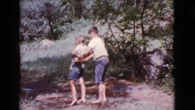 1968: children are seen swinging COTTONWOOD, ARIZONA