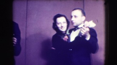 1941: several couples wearing elegant formal attire are dancing happily NEW YORK